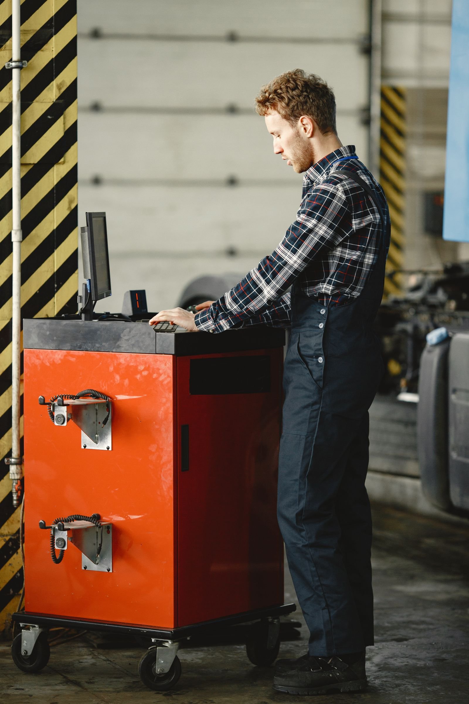 Diagnostic technician reviewing vehicle system information
